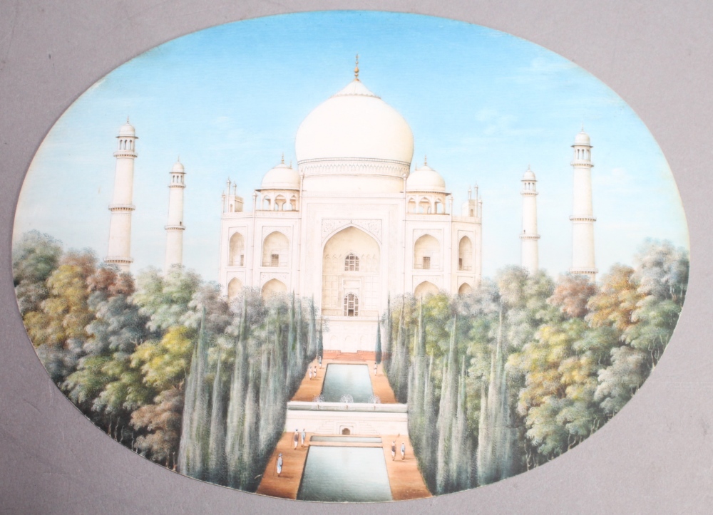 A 19th century Indian oval miniature painting of the Taj Mahal on ivory sheet width 17.5cm approx.