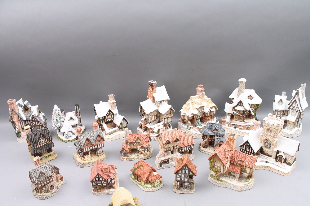 A collection of nineteen assorted David Winter cottages.