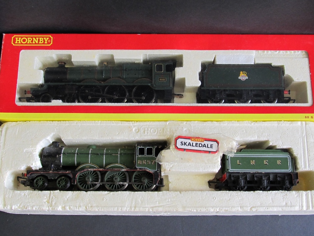 A Hornby boxed OO gauge 4-6-0 `Warwick Castle` loco and tender, and a Hornby OO gauge 4-6-0 loco and