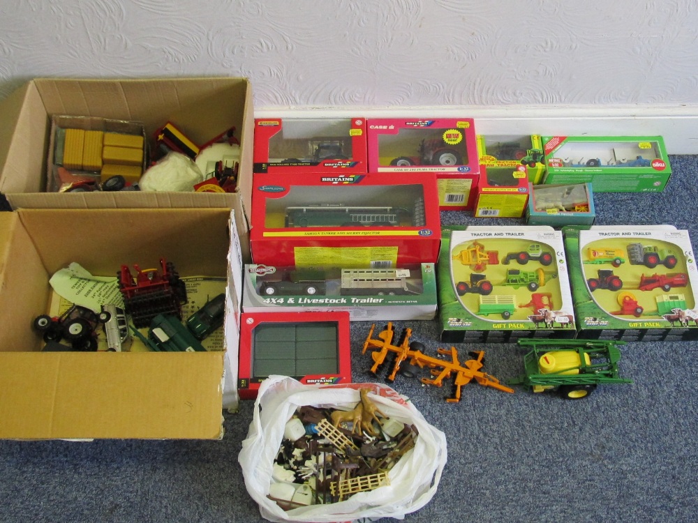 A collection of farm related die-cast items and other toys to include boxed Britains Case and New