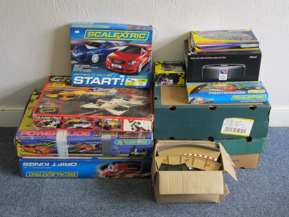 Scalextric: a boxed `Drift Kings` set, boxed `Grand Prix` set, and two further boxes of track to