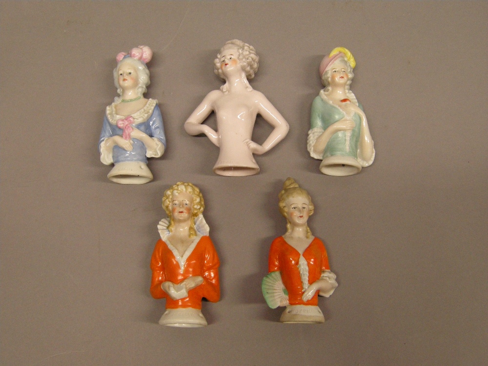 Five pin cushion dolls, the largest example approx. 13cm high.