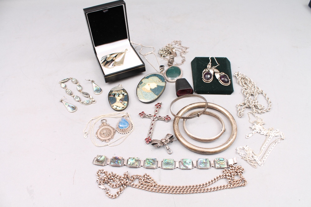 A quantity of silver jewellery to include stone set and plain pendants, bracelets, bangles, earrings