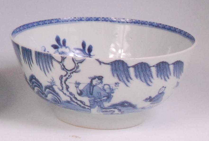 A 19th century Chinese export footed bowl, underglaze blue decorated with a fisherman and woman