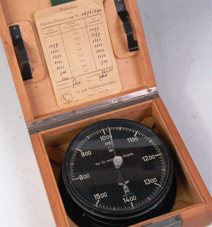 A WWII Lufftwaffe bulkhead barometer in wooden case, titled 'Prazisions-Barometer' and by Lufft,