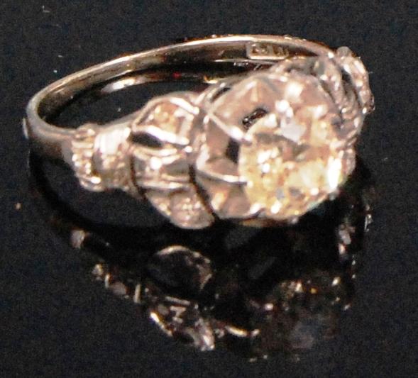 A ladies 18ct white gold diamond solitaire ring, the claw set old brilliant weighing approx. 0.75ct,