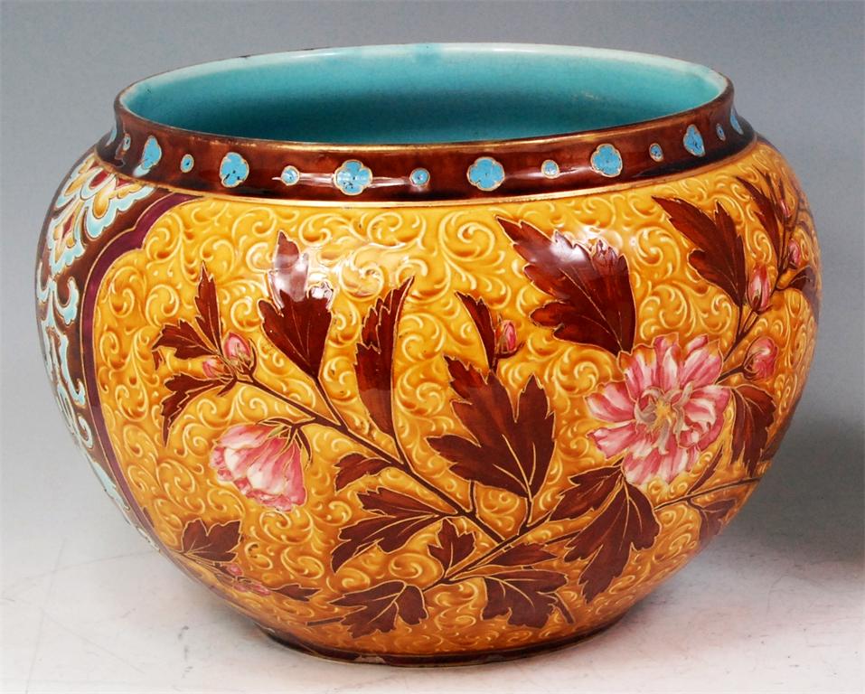 An Art Nouveau Sarreguemines glazed pottery jardiniere, of circular bulbous form, having all-over