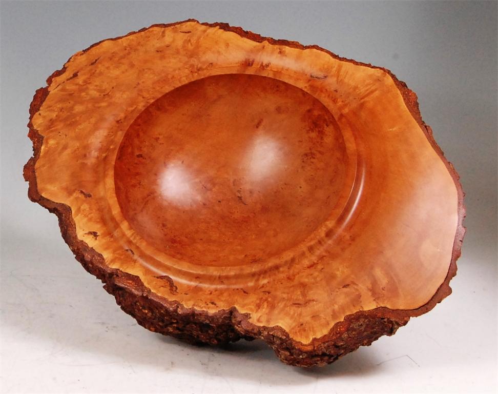 A contemporary burr walnut root bowl, having bark exterior and circular red seal mark to base, w.