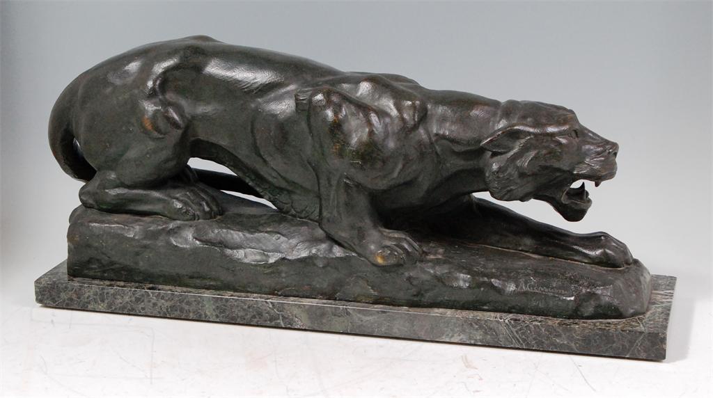 A Cipriany - A large Art Deco bronze figure of a prowling tiger, on integral naturalistic base,