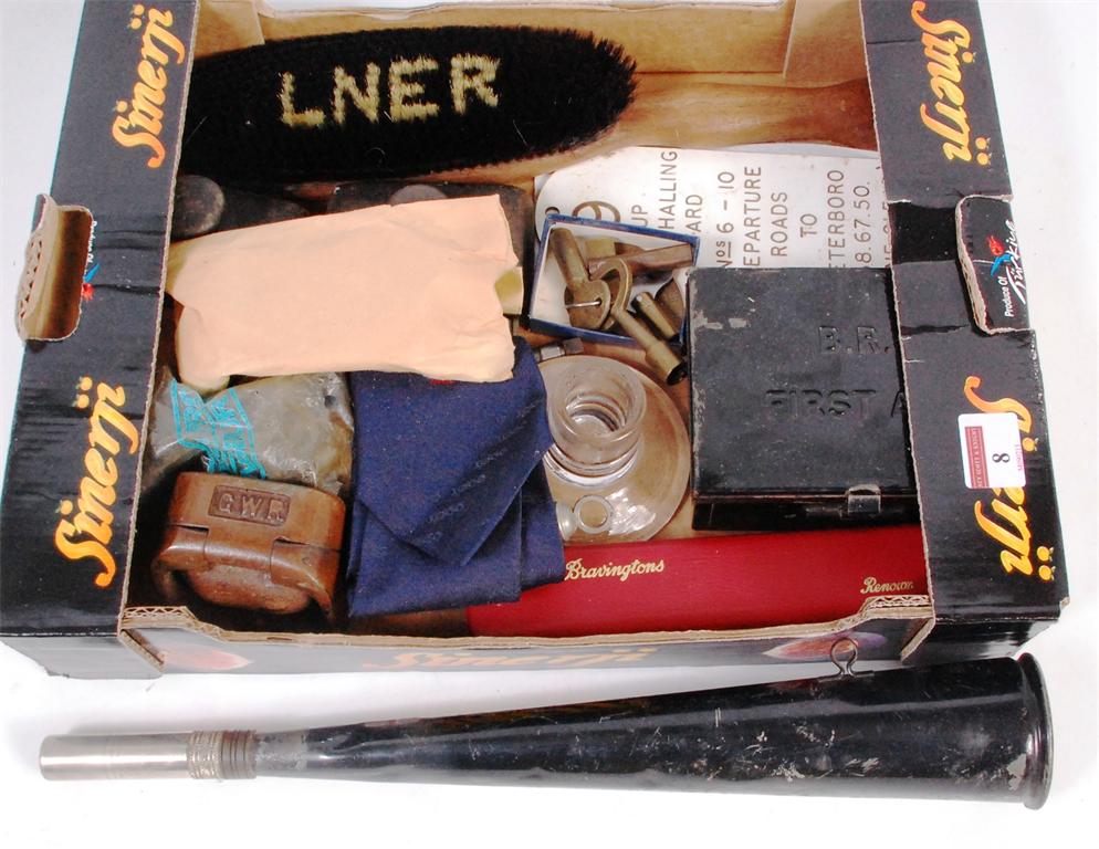 A mixed delve including LNER clothes brush and thunderer whistles, small BR first aid box with