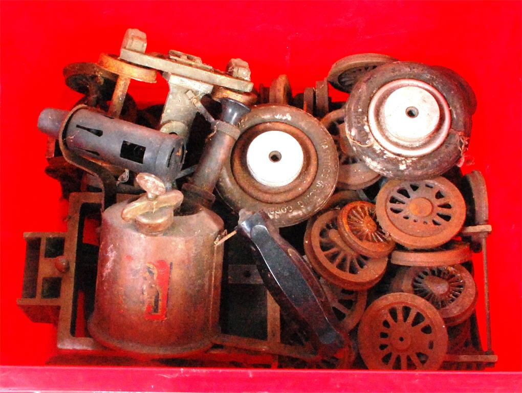 Quantity of steam locomotive wheels, various bogies, fire grate and a blow lamp etc