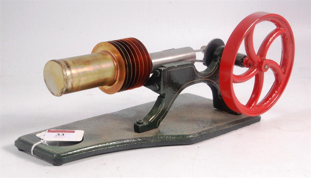 Unknown make, as new hot air engine with single cylinder, large 4.5 inch diameter flywheel, cast