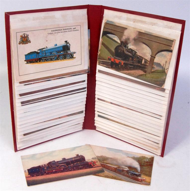 Album containing various railway/locomotive postcards to include LNW, Caledonian, Great Central etc,