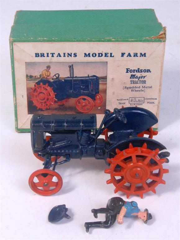 Britains Farm, Fordson Major tractor 127F, orange spudded metal wheels, with driver. Model needs