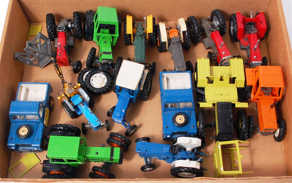 14 unboxed playworn Britains tractors to include; Massey Ferguson 595, Ford 6600, MB trac 1500,