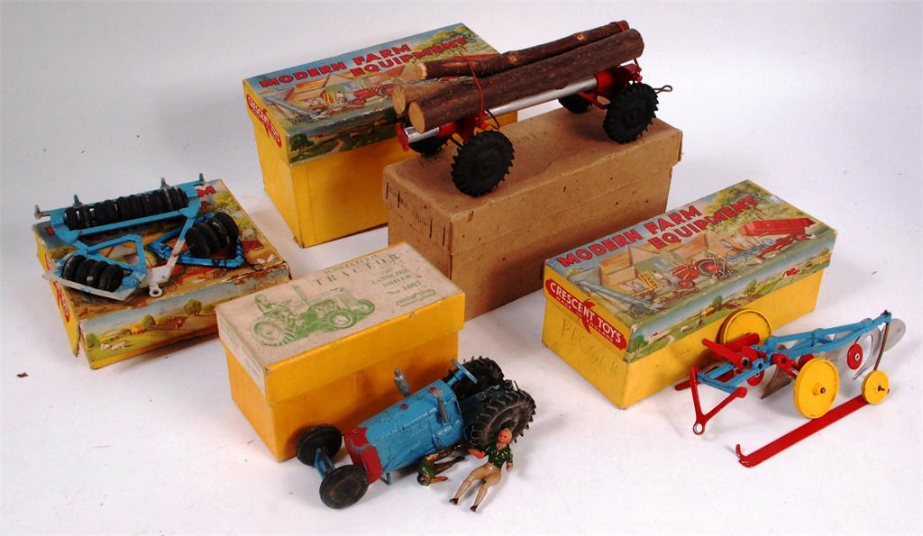 A quantity of mainly damaged boxed crescent, modern farm equipment items to include; No.1805