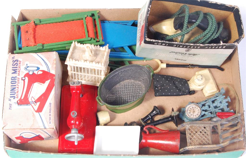 A quantity of home/domestic toy miniatures to include; Britains iron in box base, 2 deck chairs,