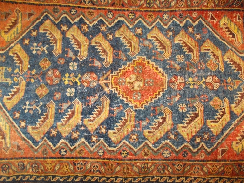 Small Kurdish rug with medallion and recumbent serrated leaf design on blue ground with borders