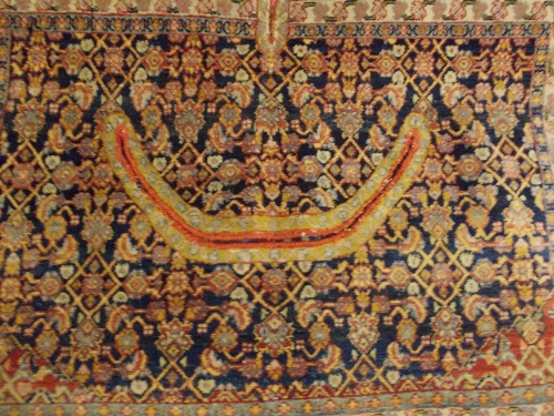 Unusual Hamadan saddle rug with cut-out for saddle and pommel, the all-over Herati design on a