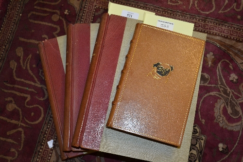 Three volumes of 'Hutchinsons Dog Encyclopaedia' part leather bound and a leather bound volume 'Dogs