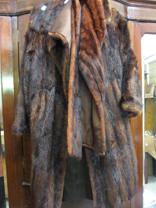 Two ladies three quarter length brown fur coats, together with a similar stole