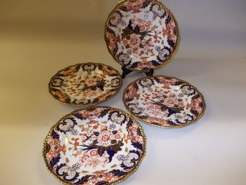 Group of four 19th Century Derby Imari pattern plates