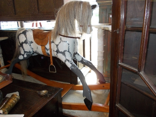 20th Century grey and white painted child`s rocking horse with leather saddle
