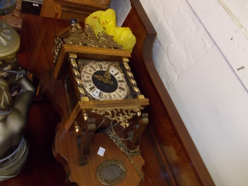 Reproduction Continental brass mounted mahogany hanging wall clock