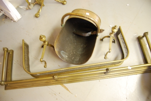 Two brass fire kerbs, a coal scuttle and pair of dogs