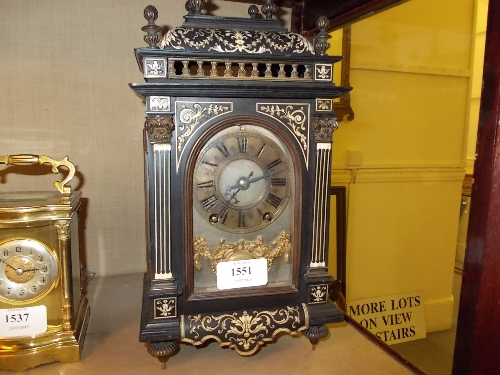 19th Century French ebonised and ivory marquetry inlaid mantel clock, the pagoda case enclosing a