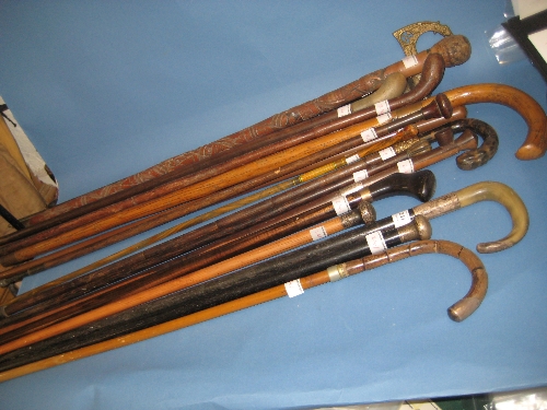 Collection of various gentlemans walking canes, including five silver mounted canes