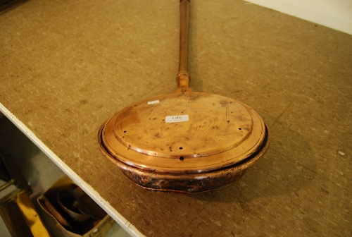 Antique copper warming pan with turned fruitwood handle