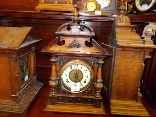 19th Century Continental walnut two train mantel clock striking on a gong