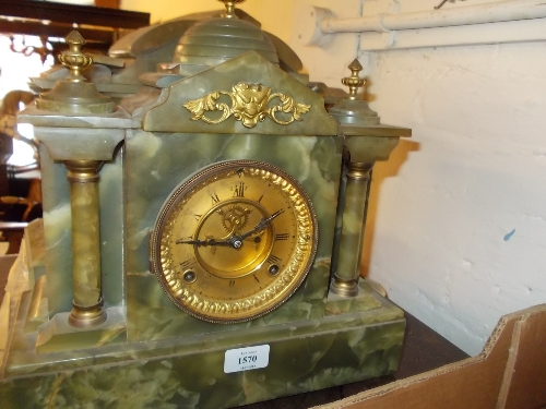 Similar onyx mantel clock with a two train visible escapement movement