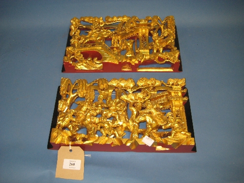 Pair of Chinese carved gilt wood wall plaques
