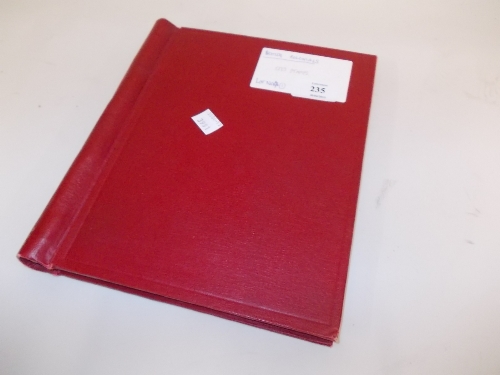 Small red album containing a quantity of various World stamps including British Colonials,