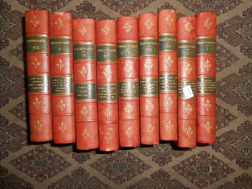 Nine volumes, `Works of Shakespeare` in marbled board bindings with leather spines and corners