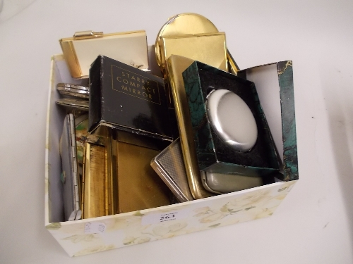 Small box containing a large quantity of various gilt metal compacts