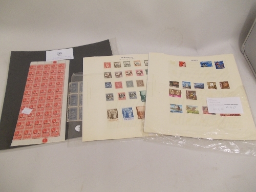 Three folios containing a quantity of various World stamps including: Barbados, Zambia, Zanzibar and