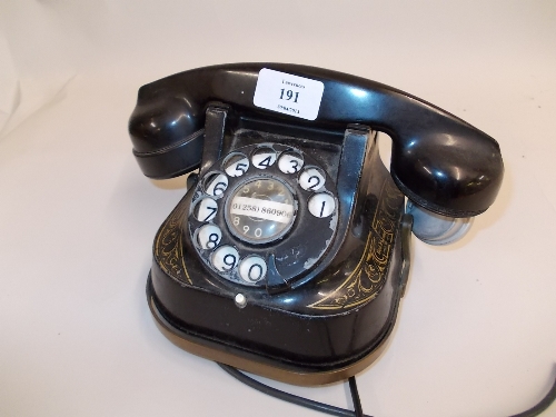 Early 20th Century telephone by the Bell Edison Telephone Company (lacking mouthpiece)