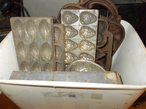 Quantity of die-cast metal chocolate moulds