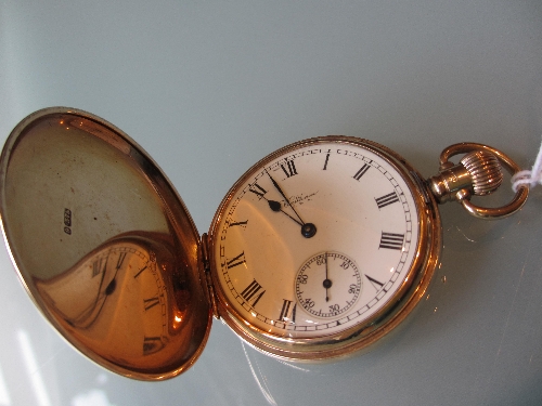 9ct Gold cased crown wind full hunter pocket watch by Waltham, the enamel dial with Roman numerals