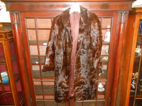 Ladies three quarter length fur coat