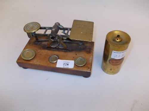 Pair of 19th Century mahogany and brass postal scales with integral weights together with a brass