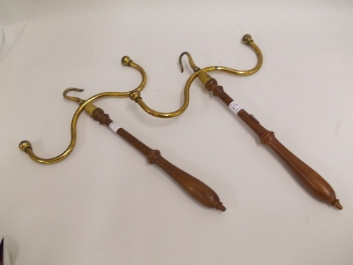 Pair of 19th Century turned wooden and gilt brass coat hangers