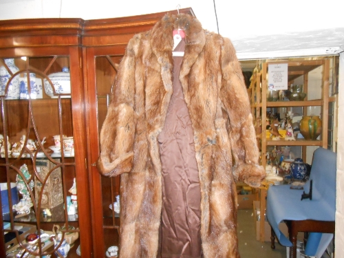 Ladies three quarter length fur coat together with another white short fur coat