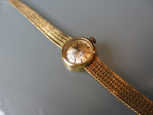 Ladies Omega 18ct gold wristwatch with integral bracelet strap