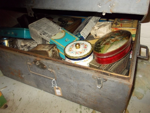 Large tin trunk containing a large quantity of various early 20th Century and later trade tins