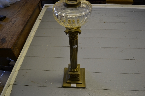 Large 19th Century gilt brass Corinthian column oil lamp base with a glass well