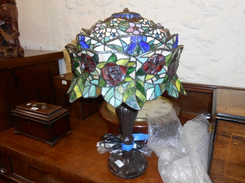Reproduction Tiffany style table lamp with leaded glass shade